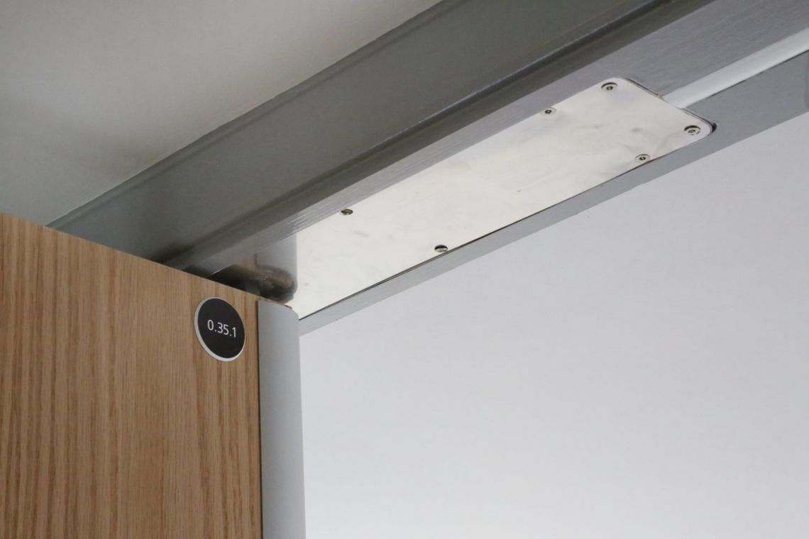 Integral finger guard with door closer Designs out the problem